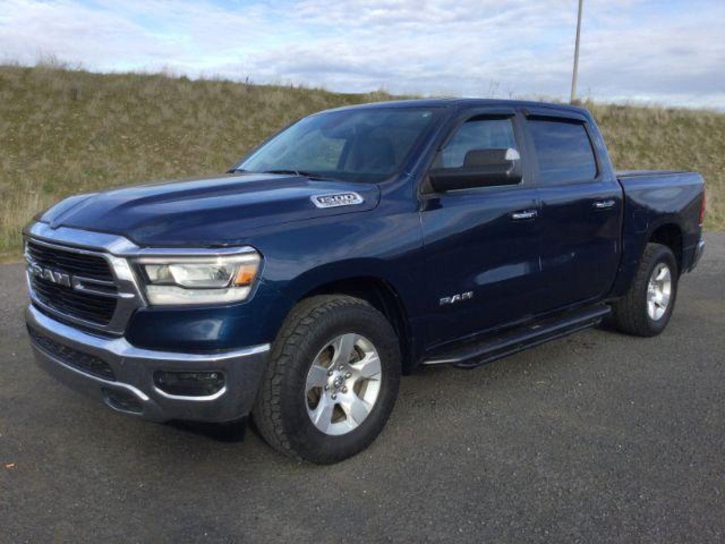 2019 Patriot Blue Pearlcoat /Diesel Gray/Black Ram 1500 Big Horn/Lone Star Crew Cab 4x4 5'7 Box (1C6SRFFT6KN) with an HEMI 5.7L V-8 variable valve control engine, 8-Speed Automatic transmission, located at 1801 Main Street, Lewiston, 83501, (208) 743-9371, 46.417065, -117.004799 - Photo#0