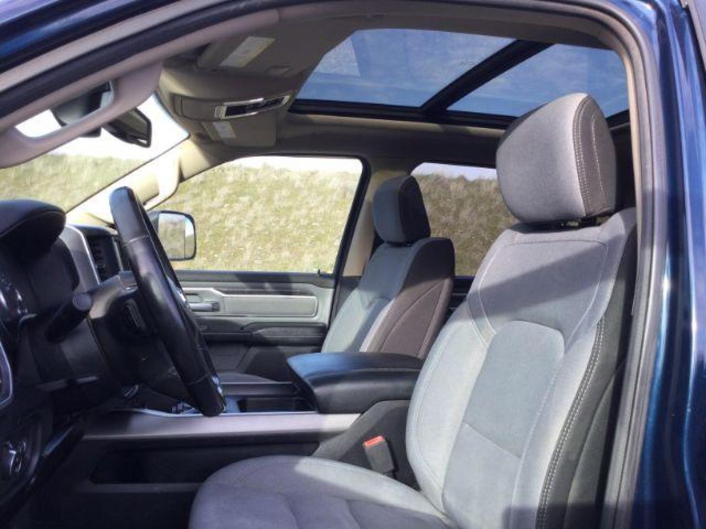 2019 Patriot Blue Pearlcoat /Diesel Gray/Black Ram 1500 Big Horn/Lone Star Crew Cab 4x4 5'7 Box (1C6SRFFT6KN) with an HEMI 5.7L V-8 variable valve control engine, 8-Speed Automatic transmission, located at 1801 Main Street, Lewiston, 83501, (208) 743-9371, 46.417065, -117.004799 - Photo#4