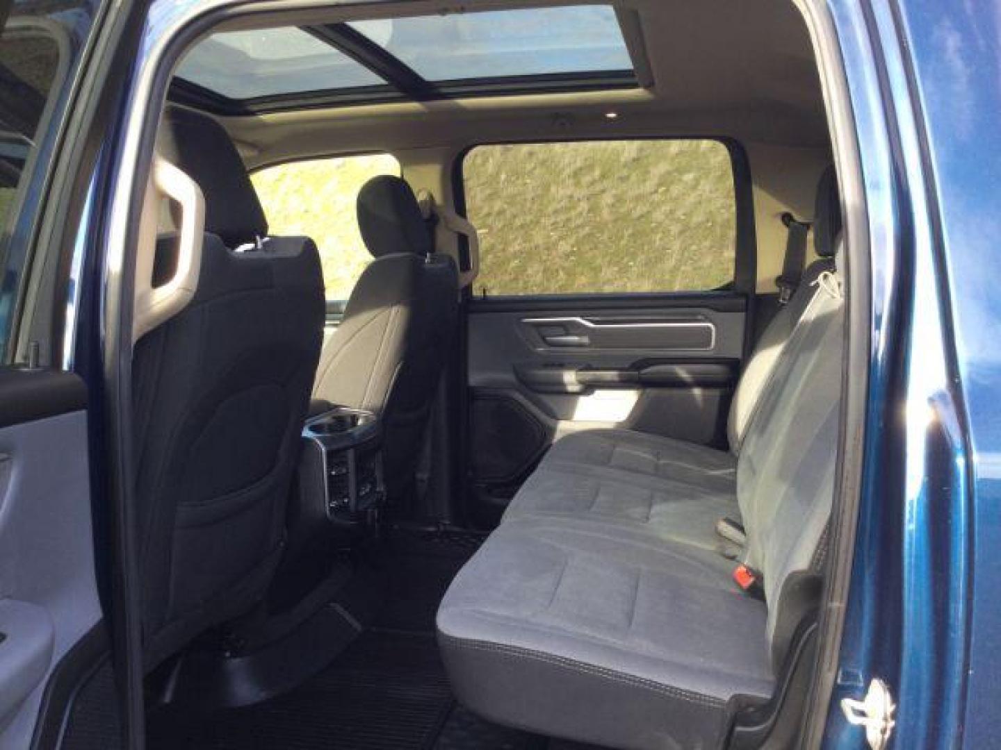 2019 Patriot Blue Pearlcoat /Diesel Gray/Black Ram 1500 Big Horn/Lone Star Crew Cab 4x4 5'7 Box (1C6SRFFT6KN) with an HEMI 5.7L V-8 variable valve control engine, 8-Speed Automatic transmission, located at 1801 Main Street, Lewiston, 83501, (208) 743-9371, 46.417065, -117.004799 - Photo#5