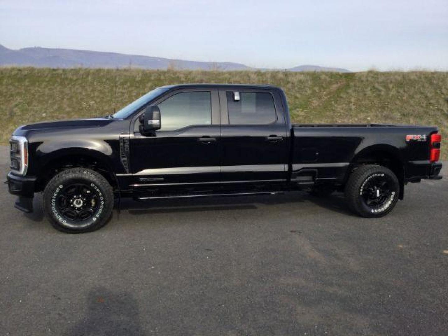 2024 Agate Black Metallic /Medium Dark Slate Ford F-350 Crew Cab STX Long Bed 4WD (1FT8W3BT8RE) with an Powerstroke 6.7L V-8 diesel direct injection engine, 10-speed automatic transmission, located at 1801 Main Street, Lewiston, 83501, (208) 743-9371, 46.417065, -117.004799 - Photo#1