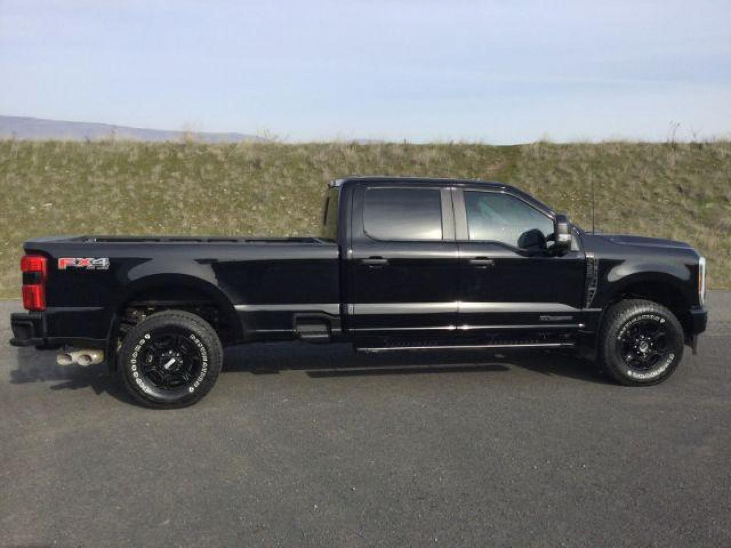 2024 Agate Black Metallic /Medium Dark Slate Ford F-350 Crew Cab STX Long Bed 4WD (1FT8W3BT8RE) with an Powerstroke 6.7L V-8 diesel direct injection engine, 10-speed automatic transmission, located at 1801 Main Street, Lewiston, 83501, (208) 743-9371, 46.417065, -117.004799 - Photo#2