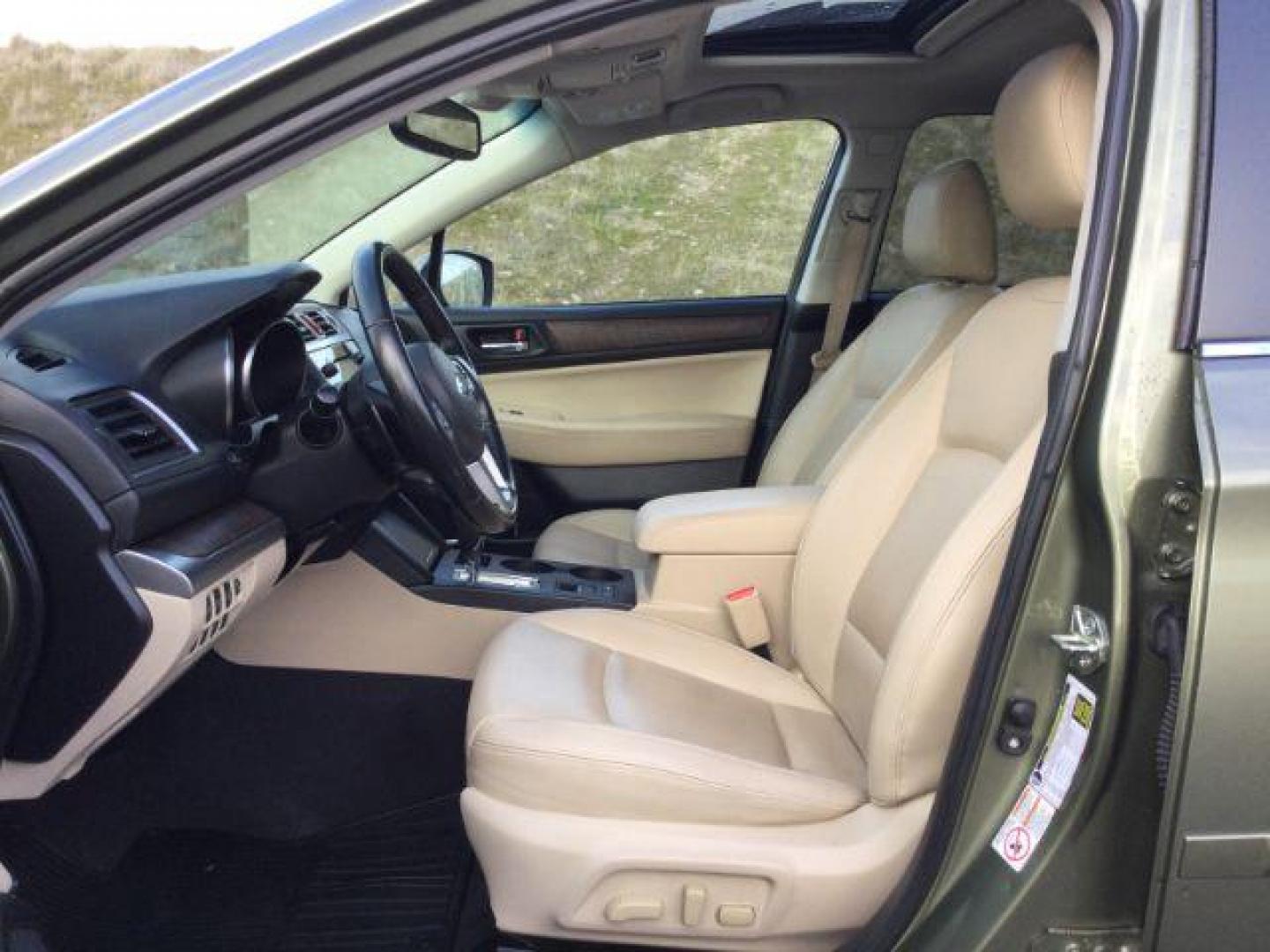 2016 Wilderness Green Metallic /Warm Ivory Leather, leather Subaru Outback 2.5i Limited (4S4BSANC3G3) with an 2.5L H4 DOHC 16V engine, Continuously Variable Transmission transmission, located at 1801 Main Street, Lewiston, 83501, (208) 743-9371, 46.417065, -117.004799 - Photo#4