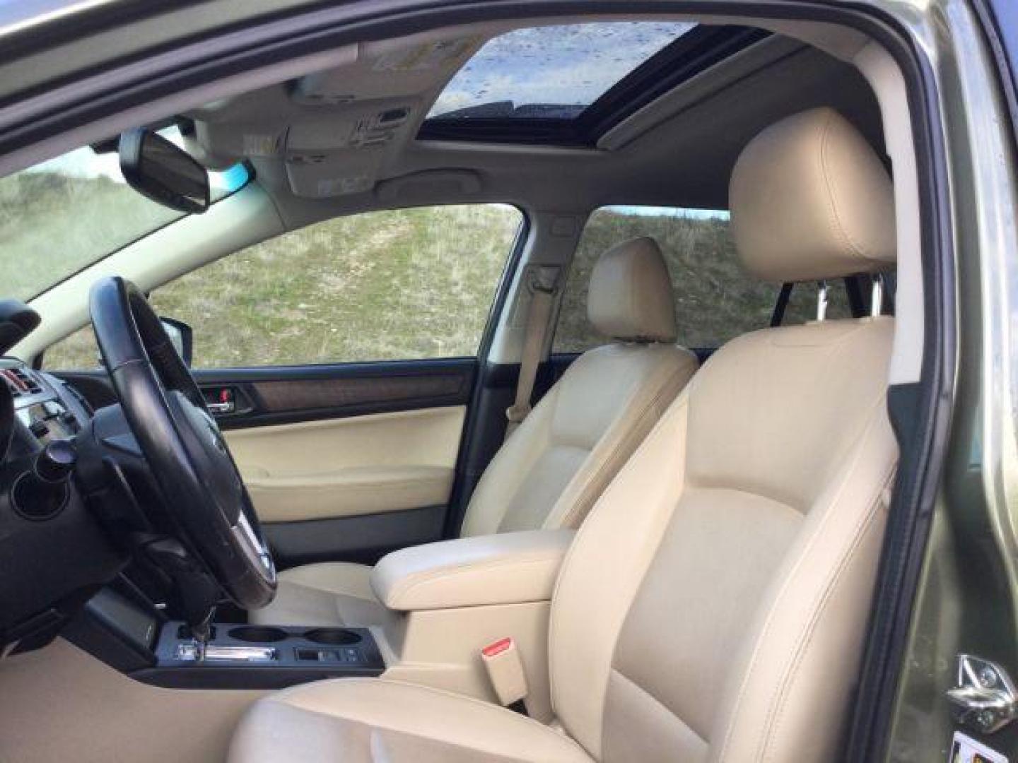 2016 Wilderness Green Metallic /Warm Ivory Leather, leather Subaru Outback 2.5i Limited (4S4BSANC3G3) with an 2.5L H4 DOHC 16V engine, Continuously Variable Transmission transmission, located at 1801 Main Street, Lewiston, 83501, (208) 743-9371, 46.417065, -117.004799 - Photo#5