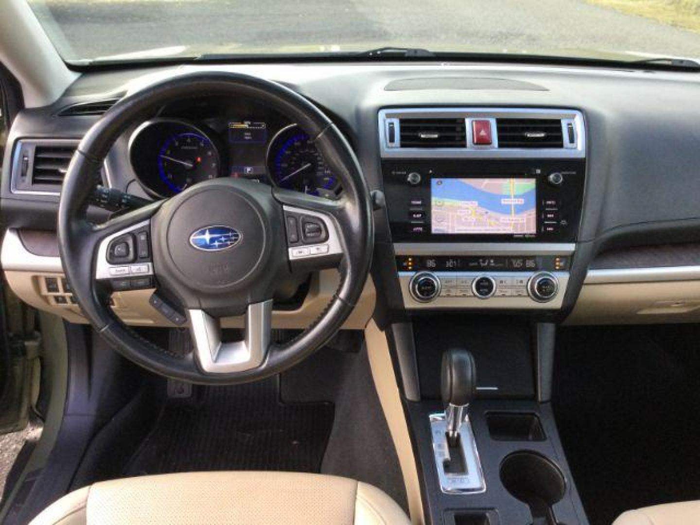 2016 Wilderness Green Metallic /Warm Ivory Leather, leather Subaru Outback 2.5i Limited (4S4BSANC3G3) with an 2.5L H4 DOHC 16V engine, Continuously Variable Transmission transmission, located at 1801 Main Street, Lewiston, 83501, (208) 743-9371, 46.417065, -117.004799 - Photo#6