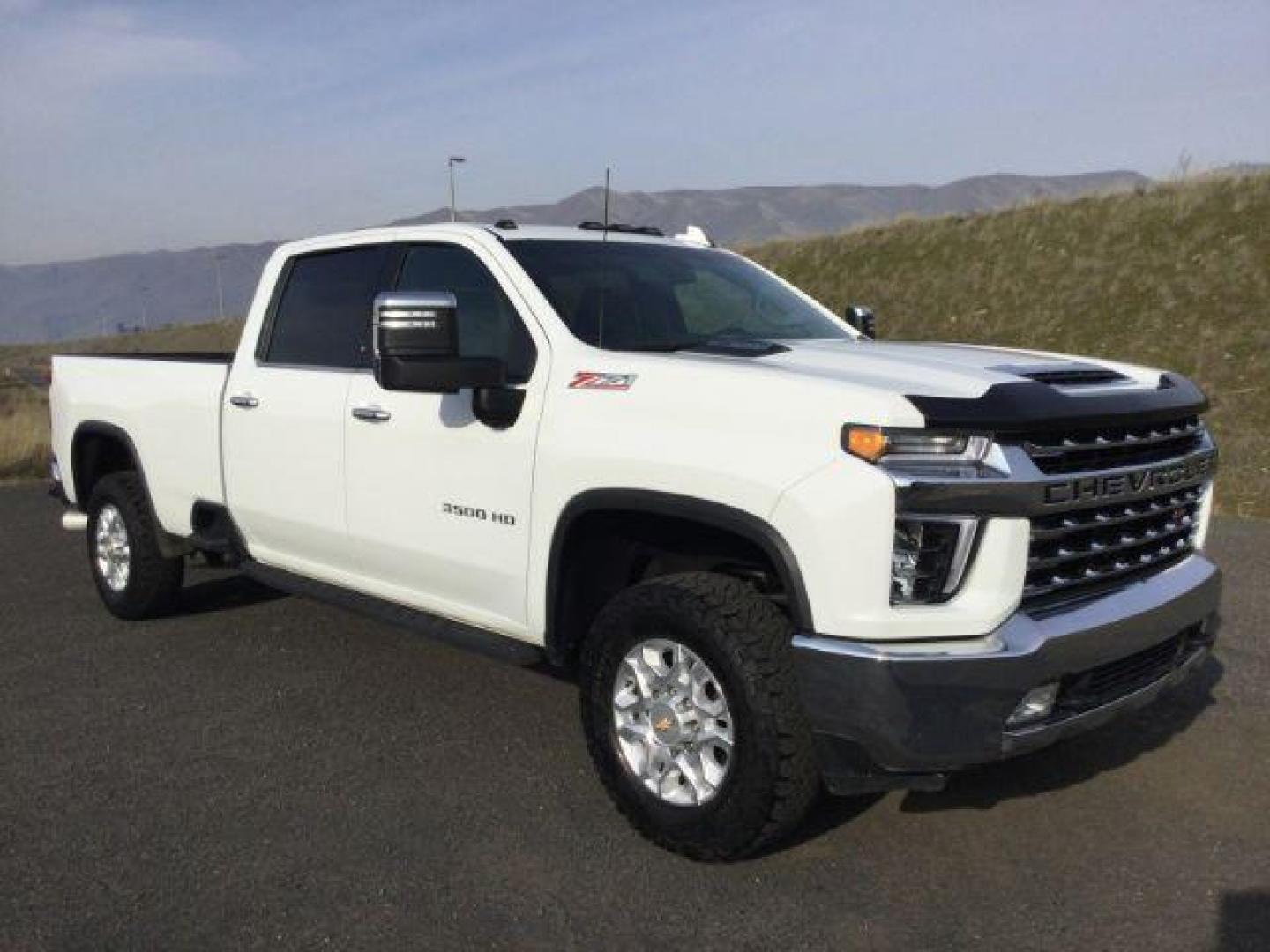 2023 Summit White /Jet Black Chevrolet Silverado 3500HD Crew Cab LTZ Long Bed 4x4 (1GC4YUEY1PF) with an Duramax 6.6L V-8 diesel direct injection engine, 10-speed automatic transmission, located at 1801 Main Street, Lewiston, 83501, (208) 743-9371, 46.417065, -117.004799 - Photo#1