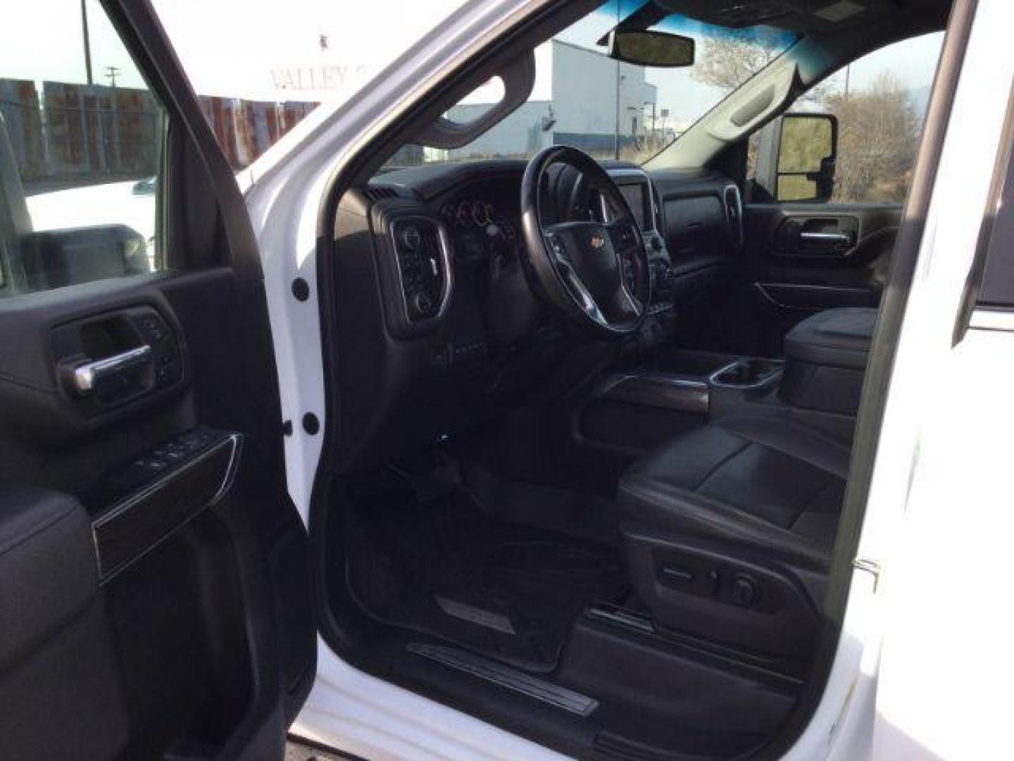 2023 Summit White /Jet Black Chevrolet Silverado 3500HD Crew Cab LTZ Long Bed 4x4 (1GC4YUEY1PF) with an Duramax 6.6L V-8 diesel direct injection engine, 10-speed automatic transmission, located at 1801 Main Street, Lewiston, 83501, (208) 743-9371, 46.417065, -117.004799 - Photo#3