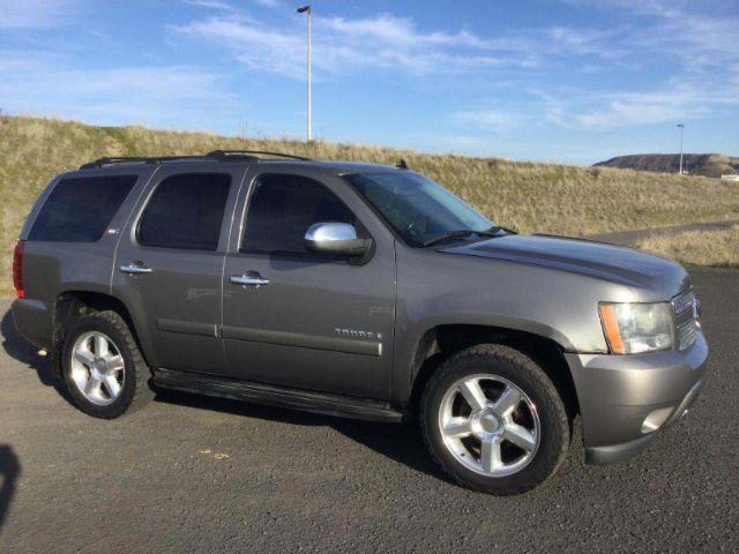2008 Graystone Metallic /Ebony Leather Interior Chevrolet Tahoe LTZ 4WD (1GNFK13028J) with an 5.3L V8 OHV 16V FFV engine, 4-Speed Automatic transmission, located at 1801 Main Street, Lewiston, 83501, (208) 743-9371, 46.417065, -117.004799 - Photo#12