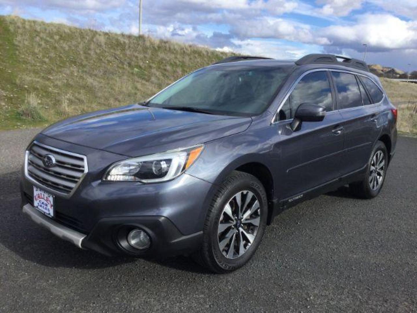 2016 Twilight Blue Metallic /Slate Black Subaru Outback 2.5i Limited (4S4BSANC9G3) with an 2.5L H-4 DOHC engine, Continuously Variable Transmission transmission, located at 1801 Main Street, Lewiston, 83501, (208) 743-9371, 46.417065, -117.004799 - Photo#0