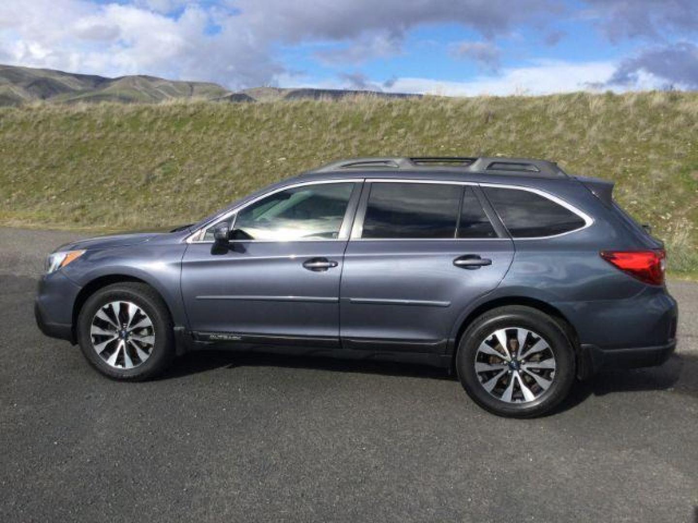 2016 Twilight Blue Metallic /Slate Black Subaru Outback 2.5i Limited (4S4BSANC9G3) with an 2.5L H-4 DOHC engine, Continuously Variable Transmission transmission, located at 1801 Main Street, Lewiston, 83501, (208) 743-9371, 46.417065, -117.004799 - Photo#1