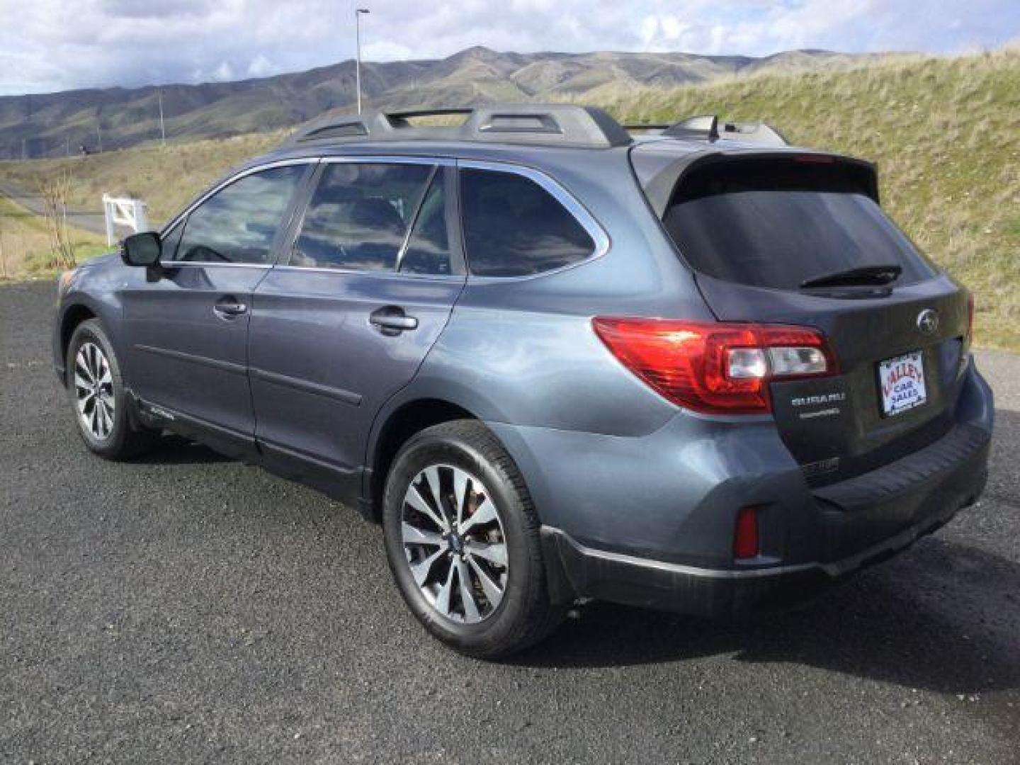 2016 Twilight Blue Metallic /Slate Black Subaru Outback 2.5i Limited (4S4BSANC9G3) with an 2.5L H-4 DOHC engine, Continuously Variable Transmission transmission, located at 1801 Main Street, Lewiston, 83501, (208) 743-9371, 46.417065, -117.004799 - Photo#2