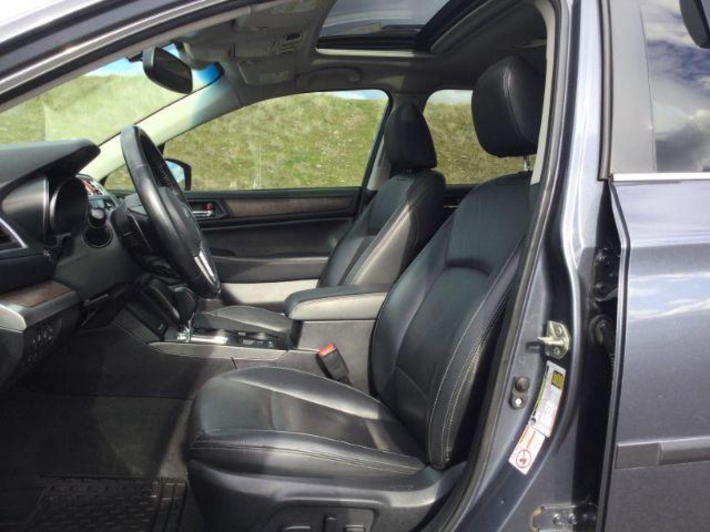 2016 Twilight Blue Metallic /Slate Black Subaru Outback 2.5i Limited (4S4BSANC9G3) with an 2.5L H-4 DOHC engine, Continuously Variable Transmission transmission, located at 1801 Main Street, Lewiston, 83501, (208) 743-9371, 46.417065, -117.004799 - Photo#4