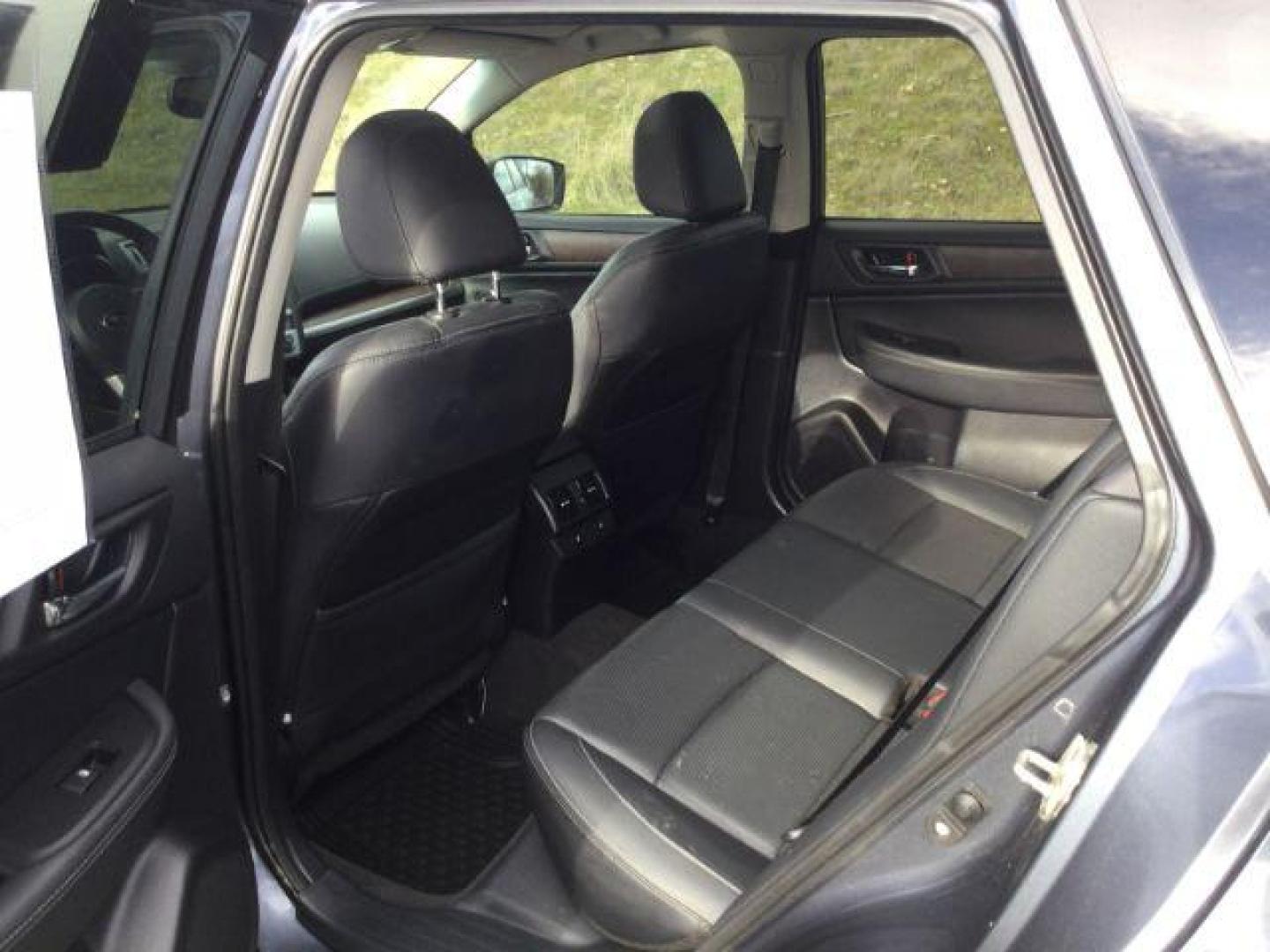 2016 Twilight Blue Metallic /Slate Black Subaru Outback 2.5i Limited (4S4BSANC9G3) with an 2.5L H-4 DOHC engine, Continuously Variable Transmission transmission, located at 1801 Main Street, Lewiston, 83501, (208) 743-9371, 46.417065, -117.004799 - Photo#6