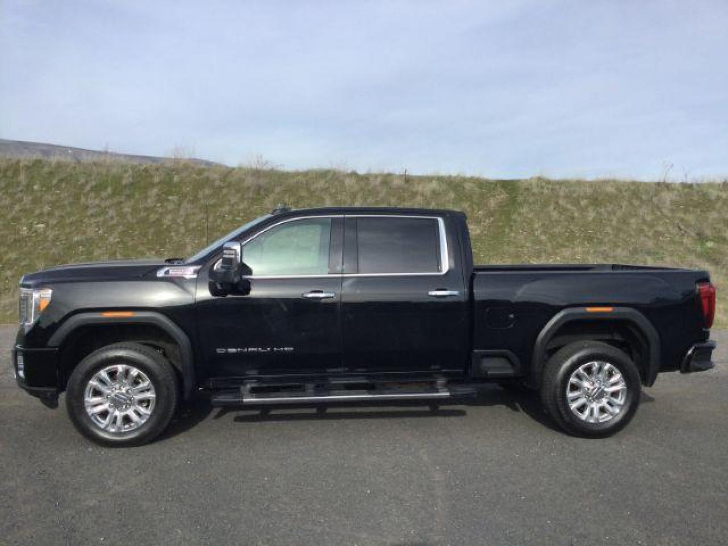 2023 Onyx Black /Jet Black GMC Sierra 3500HD Crew Cab Denali 4WD (1GT49WEY1PF) with an Duramax 6.6L V-8 diesel direct injection engine, 10 speed automatic transmission, located at 1801 Main Street, Lewiston, 83501, (208) 743-9371, 46.417065, -117.004799 - Photo#1