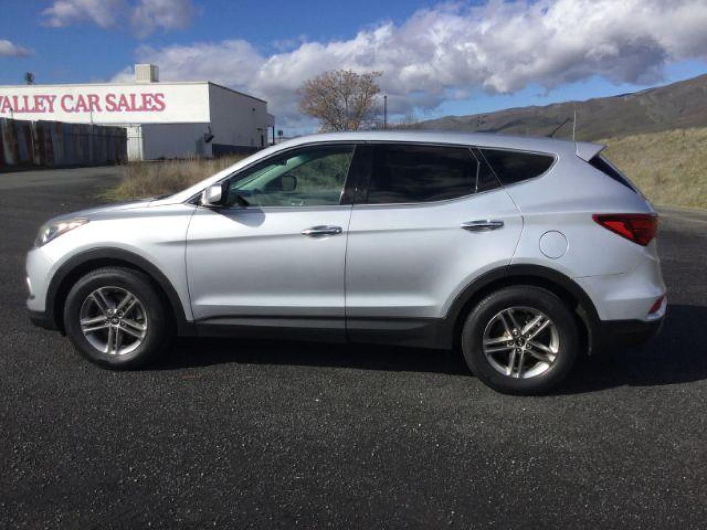 2018 Sparkling Silver /Gray Hyundai Santa Fe Sport 2.4L (5XYZTDLB0JG) with an Theta II 2.4L I-4 gasoline direct injection engine, 6-Speed Automatic transmission, located at 1801 Main Street, Lewiston, 83501, (208) 743-9371, 46.417065, -117.004799 - Photo#2