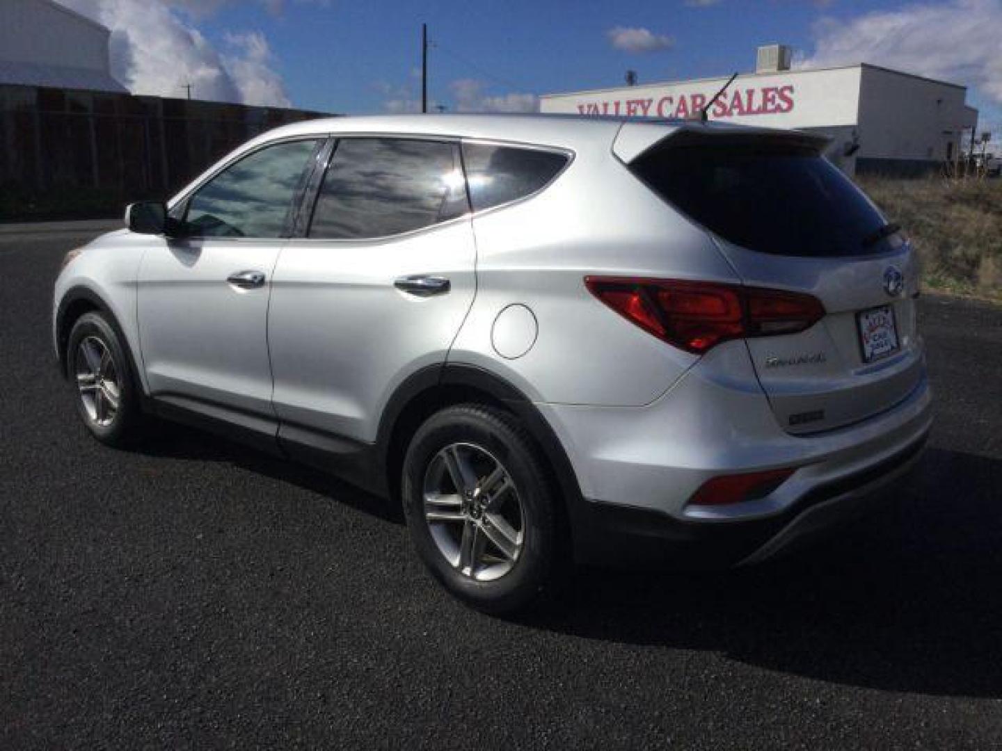2018 Sparkling Silver /Gray Hyundai Santa Fe Sport 2.4L (5XYZTDLB0JG) with an Theta II 2.4L I-4 gasoline direct injection engine, 6-Speed Automatic transmission, located at 1801 Main Street, Lewiston, 83501, (208) 743-9371, 46.417065, -117.004799 - Photo#16