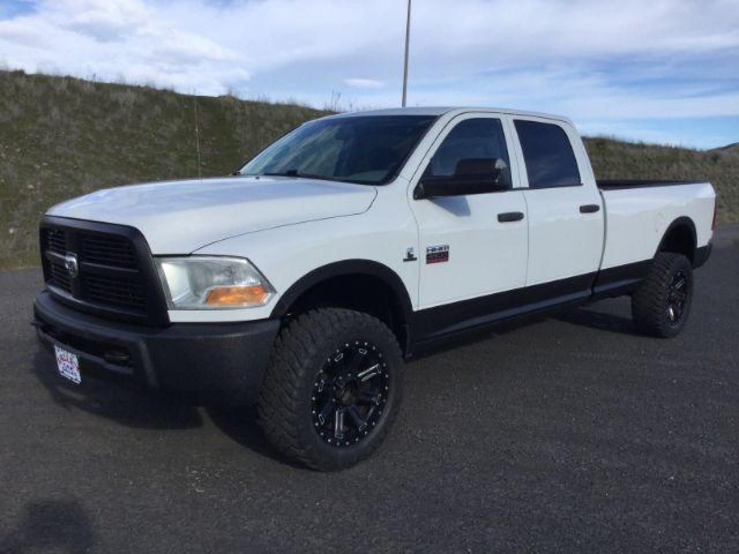 2012 Bright White /Dark Slate/Medium Graystone Cloth Interior RAM 3500 ST Crew Cab LWB 4WD (3C63D3GL5CG) with an 6.7L L6 OHV 24V TURBO DIESEL engine, 6-Speed Manual Transmission transmission, located at 1801 Main Street, Lewiston, 83501, (208) 743-9371, 46.417065, -117.004799 - Photo#0