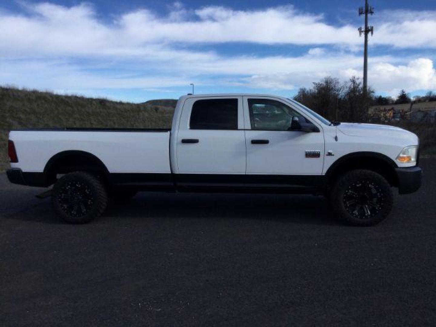 2012 Bright White /Dark Slate/Medium Graystone Cloth Interior RAM 3500 ST Crew Cab LWB 4WD (3C63D3GL5CG) with an 6.7L L6 OHV 24V TURBO DIESEL engine, 6-Speed Manual Transmission transmission, located at 1801 Main Street, Lewiston, 83501, (208) 743-9371, 46.417065, -117.004799 - Photo#1