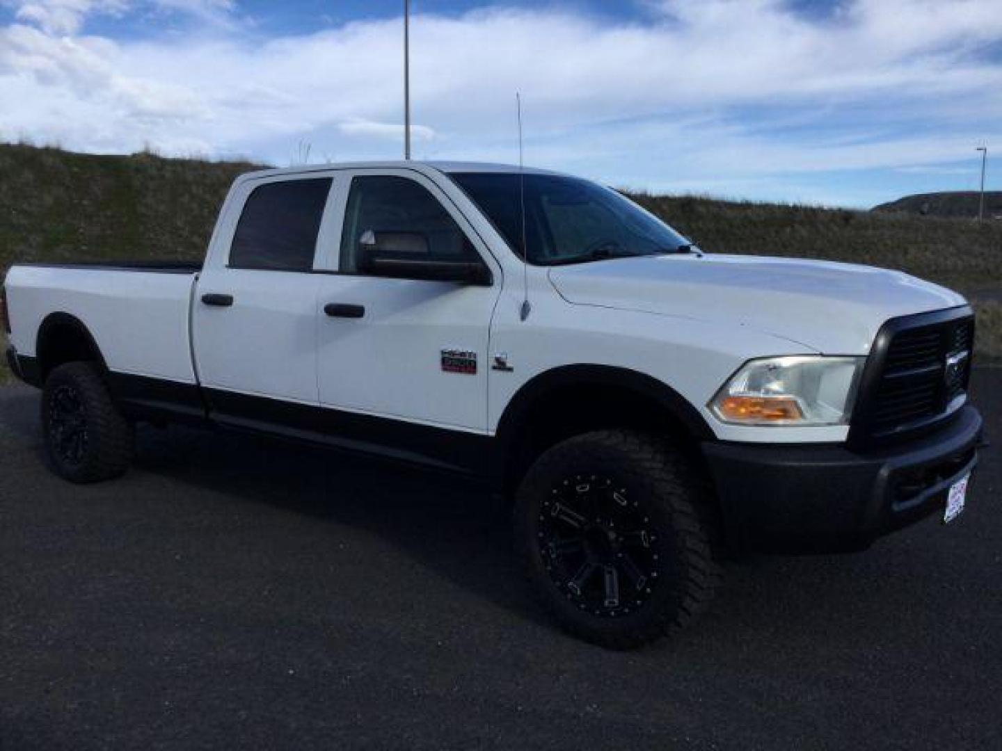 2012 Bright White /Dark Slate/Medium Graystone Cloth Interior RAM 3500 ST Crew Cab LWB 4WD (3C63D3GL5CG) with an 6.7L L6 OHV 24V TURBO DIESEL engine, 6-Speed Manual Transmission transmission, located at 1801 Main Street, Lewiston, 83501, (208) 743-9371, 46.417065, -117.004799 - Photo#2