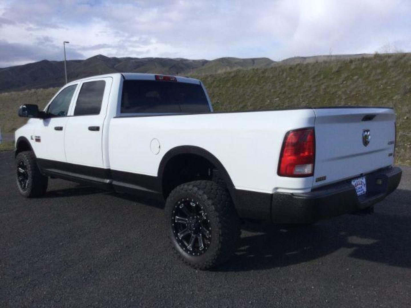 2012 Bright White /Dark Slate/Medium Graystone Cloth Interior RAM 3500 ST Crew Cab LWB 4WD (3C63D3GL5CG) with an 6.7L L6 OHV 24V TURBO DIESEL engine, 6-Speed Manual Transmission transmission, located at 1801 Main Street, Lewiston, 83501, (208) 743-9371, 46.417065, -117.004799 - Photo#6