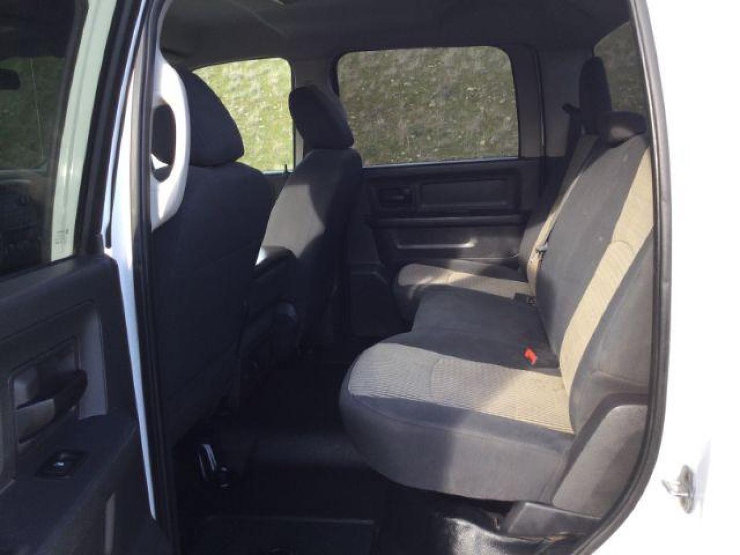 2012 Bright White /Dark Slate/Medium Graystone Cloth Interior RAM 3500 ST Crew Cab LWB 4WD (3C63D3GL5CG) with an 6.7L L6 OHV 24V TURBO DIESEL engine, 6-Speed Manual Transmission transmission, located at 1801 Main Street, Lewiston, 83501, (208) 743-9371, 46.417065, -117.004799 - Photo#10