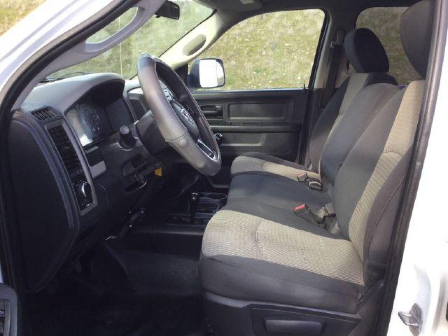 2012 Bright White /Dark Slate/Medium Graystone Cloth Interior RAM 3500 ST Crew Cab LWB 4WD (3C63D3GL5CG) with an 6.7L L6 OHV 24V TURBO DIESEL engine, 6-Speed Manual Transmission transmission, located at 1801 Main Street, Lewiston, 83501, (208) 743-9371, 46.417065, -117.004799 - Photo#11