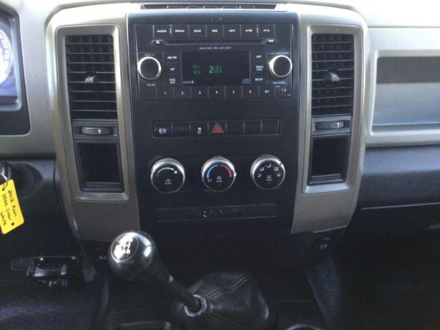 2012 Bright White /Dark Slate/Medium Graystone Cloth Interior RAM 3500 ST Crew Cab LWB 4WD (3C63D3GL5CG) with an 6.7L L6 OHV 24V TURBO DIESEL engine, 6-Speed Manual Transmission transmission, located at 1801 Main Street, Lewiston, 83501, (208) 743-9371, 46.417065, -117.004799 - Photo#12