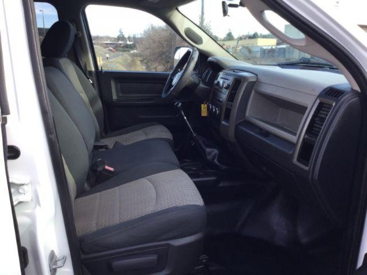 2012 Bright White /Dark Slate/Medium Graystone Cloth Interior RAM 3500 ST Crew Cab LWB 4WD (3C63D3GL5CG) with an 6.7L L6 OHV 24V TURBO DIESEL engine, 6-Speed Manual Transmission transmission, located at 1801 Main Street, Lewiston, 83501, (208) 743-9371, 46.417065, -117.004799 - Photo#19