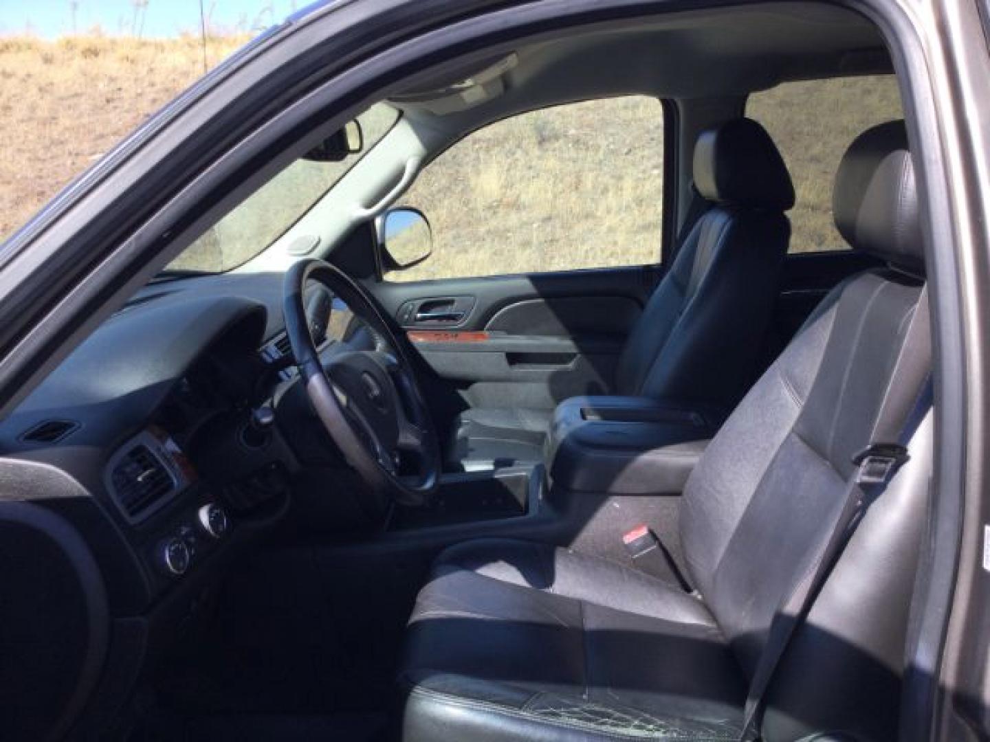 2013 Mocha Steel Metallic /Ebony GMC Sierra 1500 SLT (3GTP2WE71DG) with an Vortec 5.3L V-8 variable valve control engine, 6-SPEED AUTOMATIC transmission, located at 1801 Main Street, Lewiston, 83501, (208) 743-9371, 46.417065, -117.004799- Photo#6