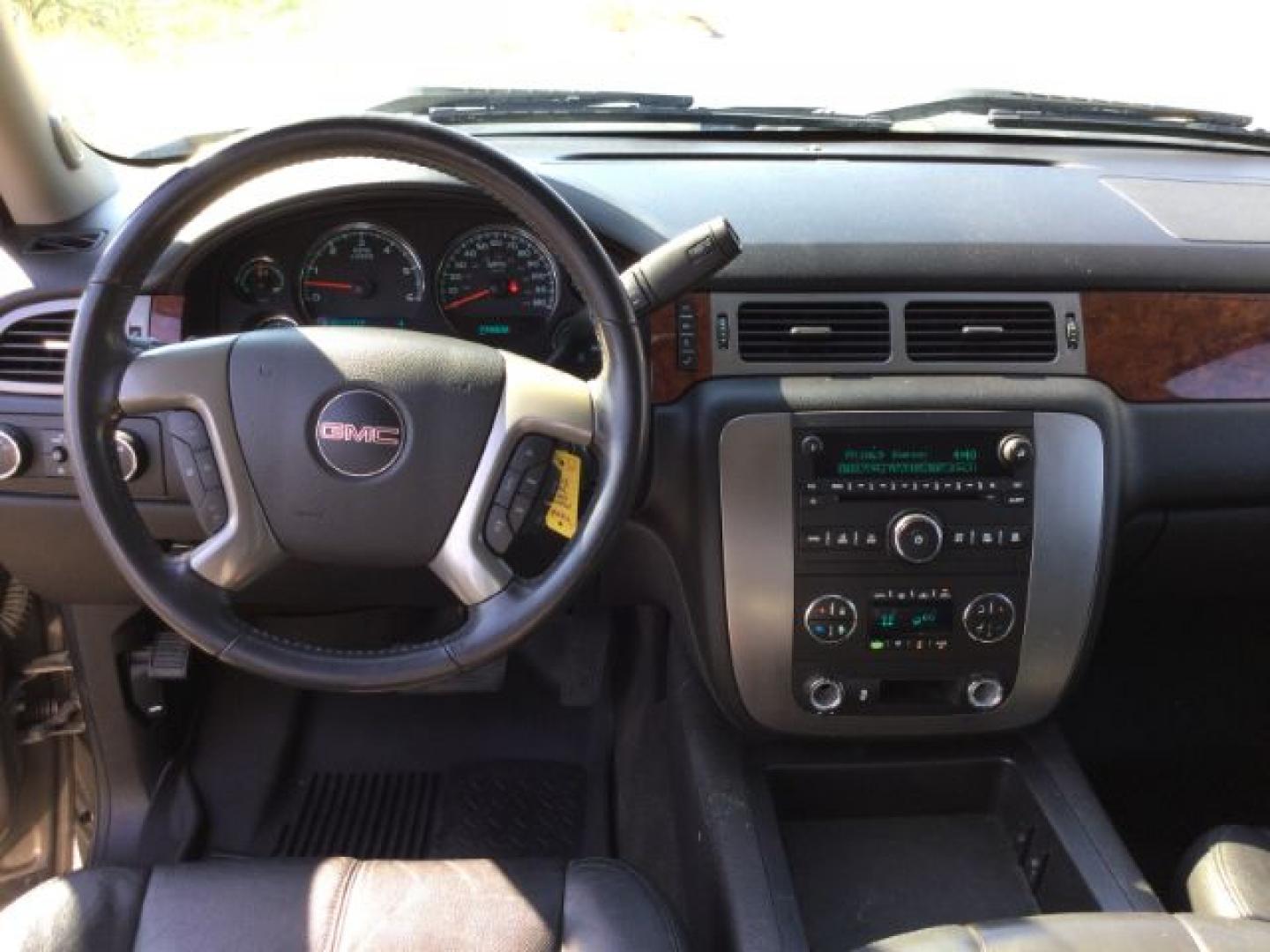 2013 Mocha Steel Metallic /Ebony GMC Sierra 1500 SLT (3GTP2WE71DG) with an Vortec 5.3L V-8 variable valve control engine, 6-SPEED AUTOMATIC transmission, located at 1801 Main Street, Lewiston, 83501, (208) 743-9371, 46.417065, -117.004799- Photo#7