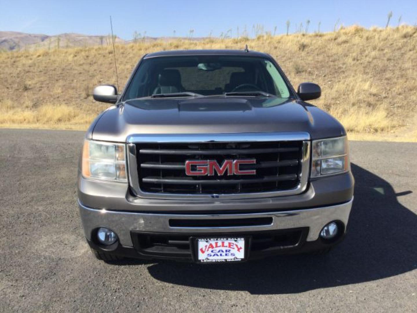 2013 Mocha Steel Metallic /Ebony GMC Sierra 1500 SLT (3GTP2WE71DG) with an Vortec 5.3L V-8 variable valve control engine, 6-SPEED AUTOMATIC transmission, located at 1801 Main Street, Lewiston, 83501, (208) 743-9371, 46.417065, -117.004799- Photo#15