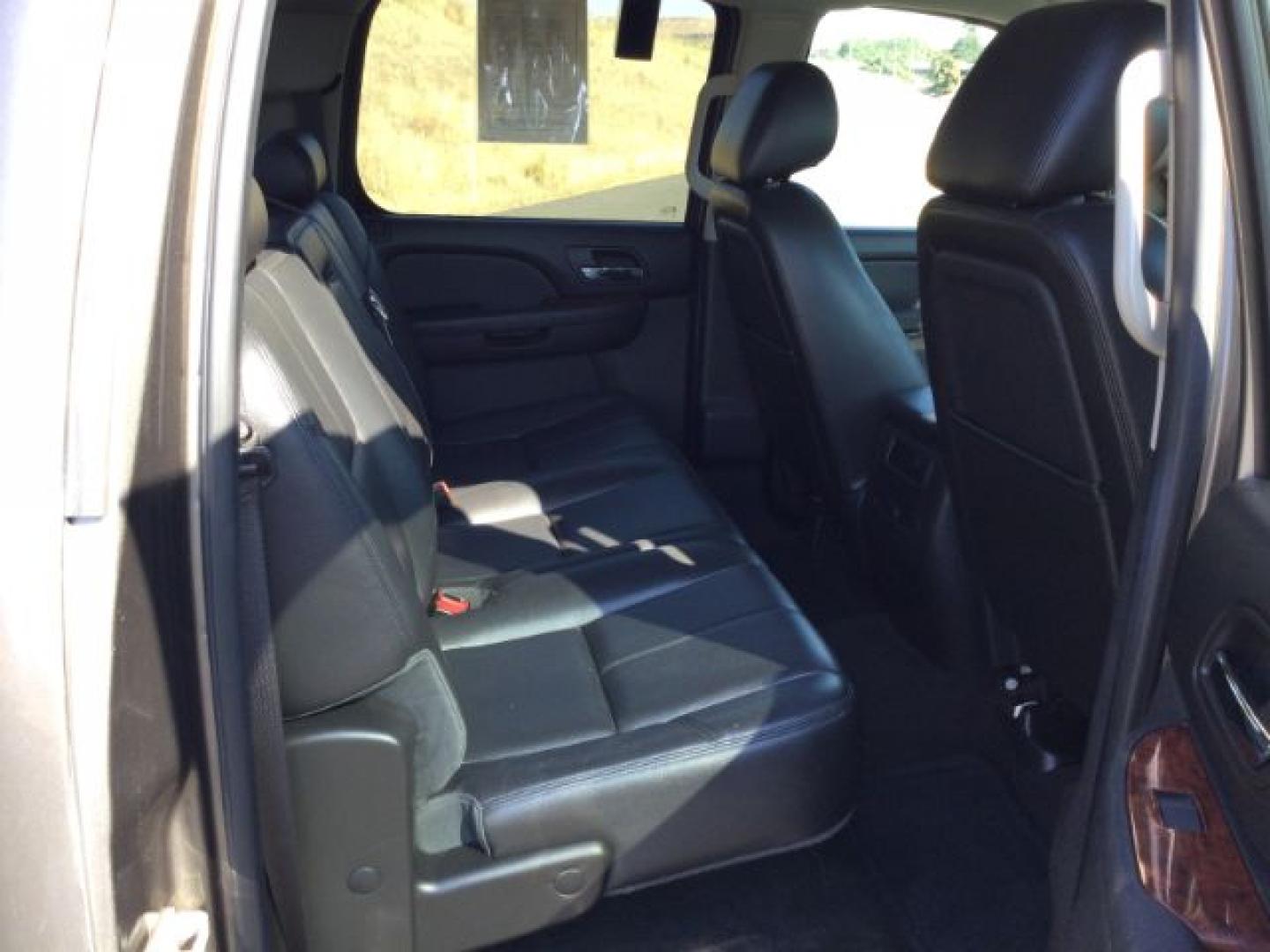 2013 Mocha Steel Metallic /Ebony GMC Sierra 1500 SLT (3GTP2WE71DG) with an Vortec 5.3L V-8 variable valve control engine, 6-SPEED AUTOMATIC transmission, located at 1801 Main Street, Lewiston, 83501, (208) 743-9371, 46.417065, -117.004799- Photo#19