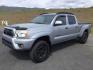 2014 SILVER /Graphite Toyota Tacoma Double Cab Long Bed V6 5AT 4WD (5TFMU4FNXEX) with an 4.0L V6 DOHC 24V engine, 5-Speed Automatic transmission, located at 1801 Main Street, Lewiston, 83501, (208) 743-9371, 46.417065, -117.004799 - Photo#1