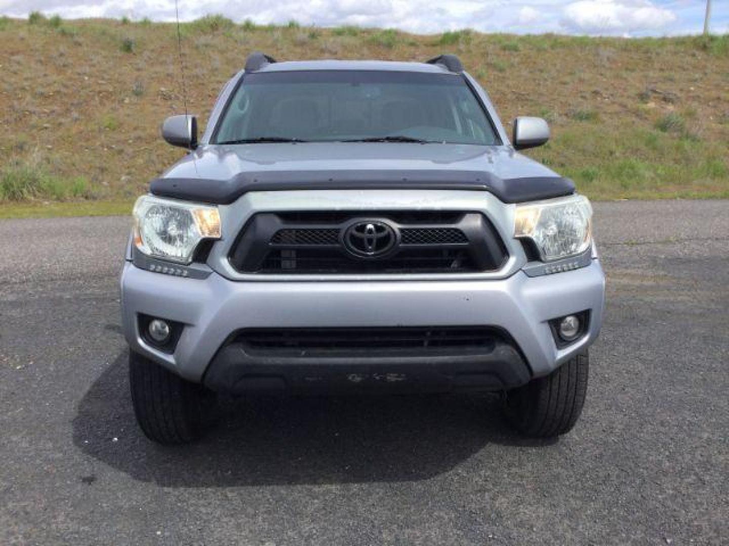 2014 SILVER /Graphite Toyota Tacoma Double Cab Long Bed V6 5AT 4WD (5TFMU4FNXEX) with an 4.0L V6 DOHC 24V engine, 5-Speed Automatic transmission, located at 1801 Main Street, Lewiston, 83501, (208) 743-9371, 46.417065, -117.004799 - Photo#2