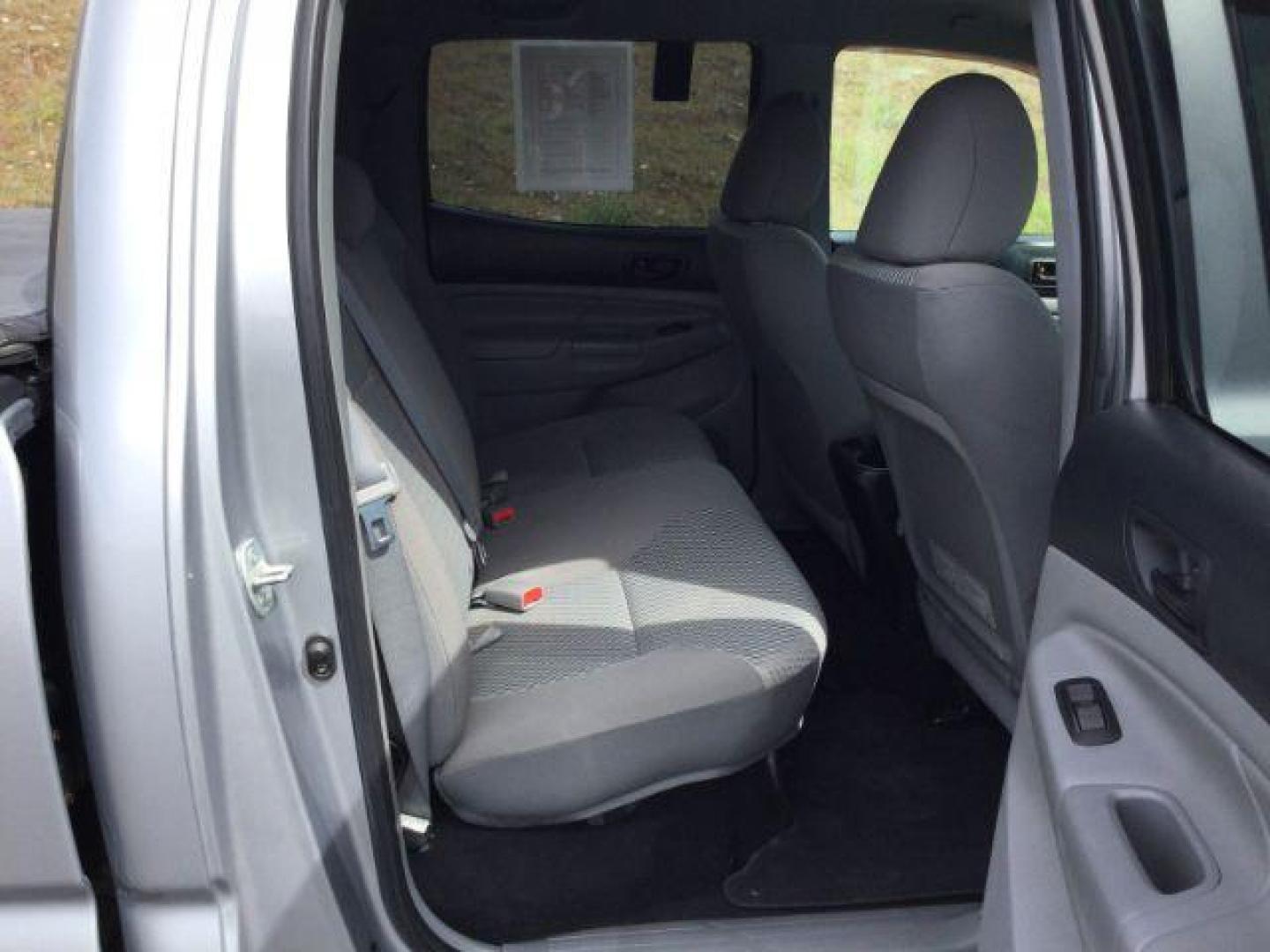 2014 SILVER /Graphite Toyota Tacoma Double Cab Long Bed V6 5AT 4WD (5TFMU4FNXEX) with an 4.0L V6 DOHC 24V engine, 5-Speed Automatic transmission, located at 1801 Main Street, Lewiston, 83501, (208) 743-9371, 46.417065, -117.004799 - Photo#13