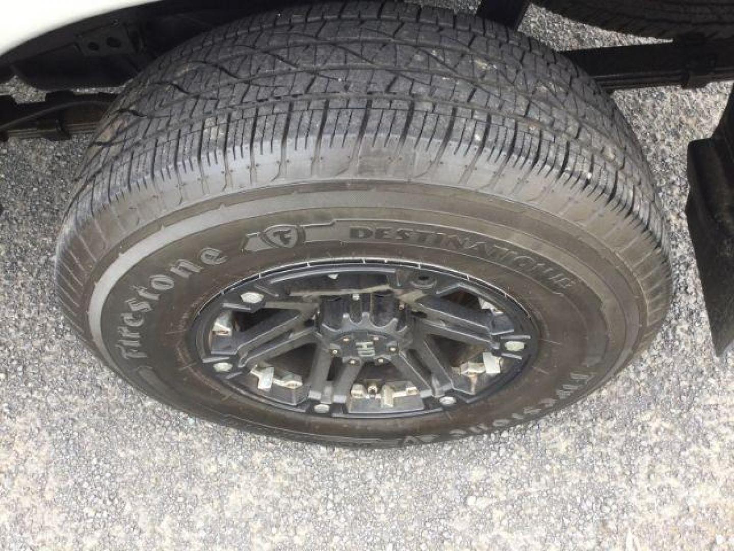 2014 SILVER /Graphite Toyota Tacoma Double Cab Long Bed V6 5AT 4WD (5TFMU4FNXEX) with an 4.0L V6 DOHC 24V engine, 5-Speed Automatic transmission, located at 1801 Main Street, Lewiston, 83501, (208) 743-9371, 46.417065, -117.004799 - Photo#16