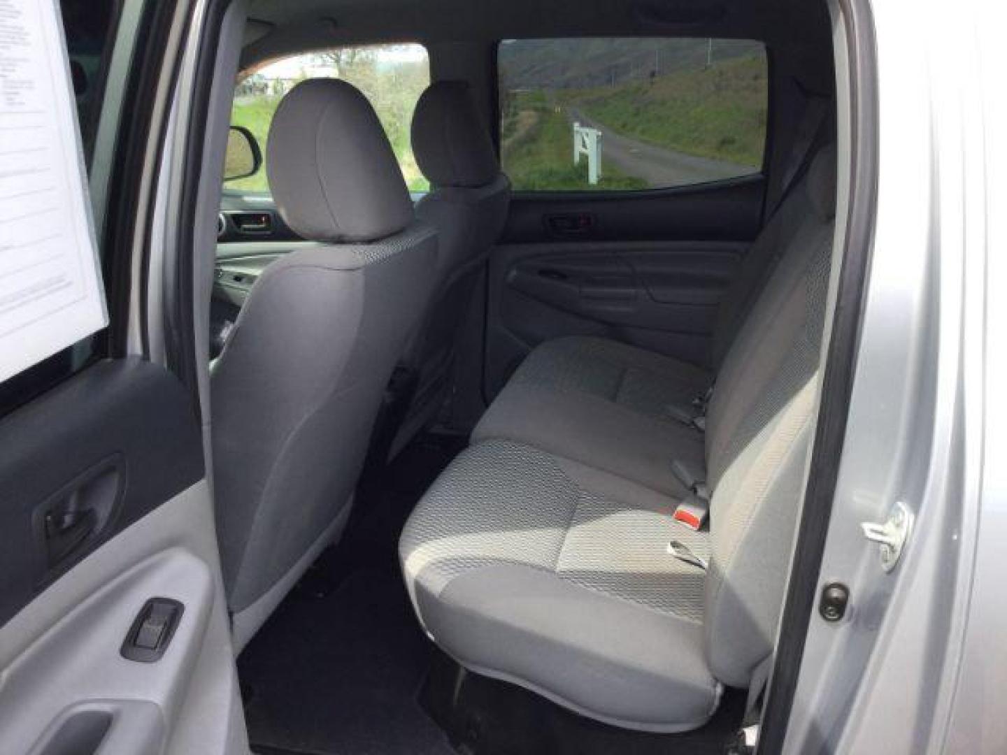 2014 SILVER /Graphite Toyota Tacoma Double Cab Long Bed V6 5AT 4WD (5TFMU4FNXEX) with an 4.0L V6 DOHC 24V engine, 5-Speed Automatic transmission, located at 1801 Main Street, Lewiston, 83501, (208) 743-9371, 46.417065, -117.004799 - Photo#19