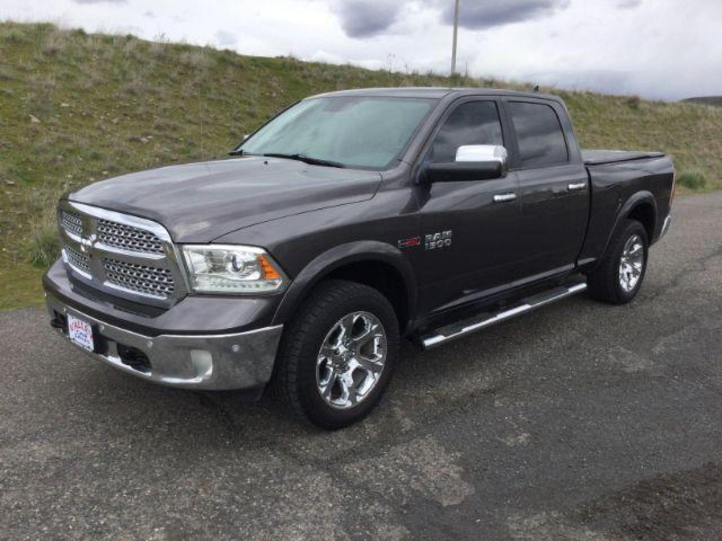 2015 Granite Crystal Metallic Clearcoat /Black Ram 1500 Laramie Crew Cab 4WD (1C6RR7VM0FS) with an EcoDiesel 3L V-6 diesel direct injection engine, 8-Speed Automatic transmission, located at 1801 Main Street, Lewiston, 83501, (208) 743-9371, 46.417065, -117.004799 - Photo#0