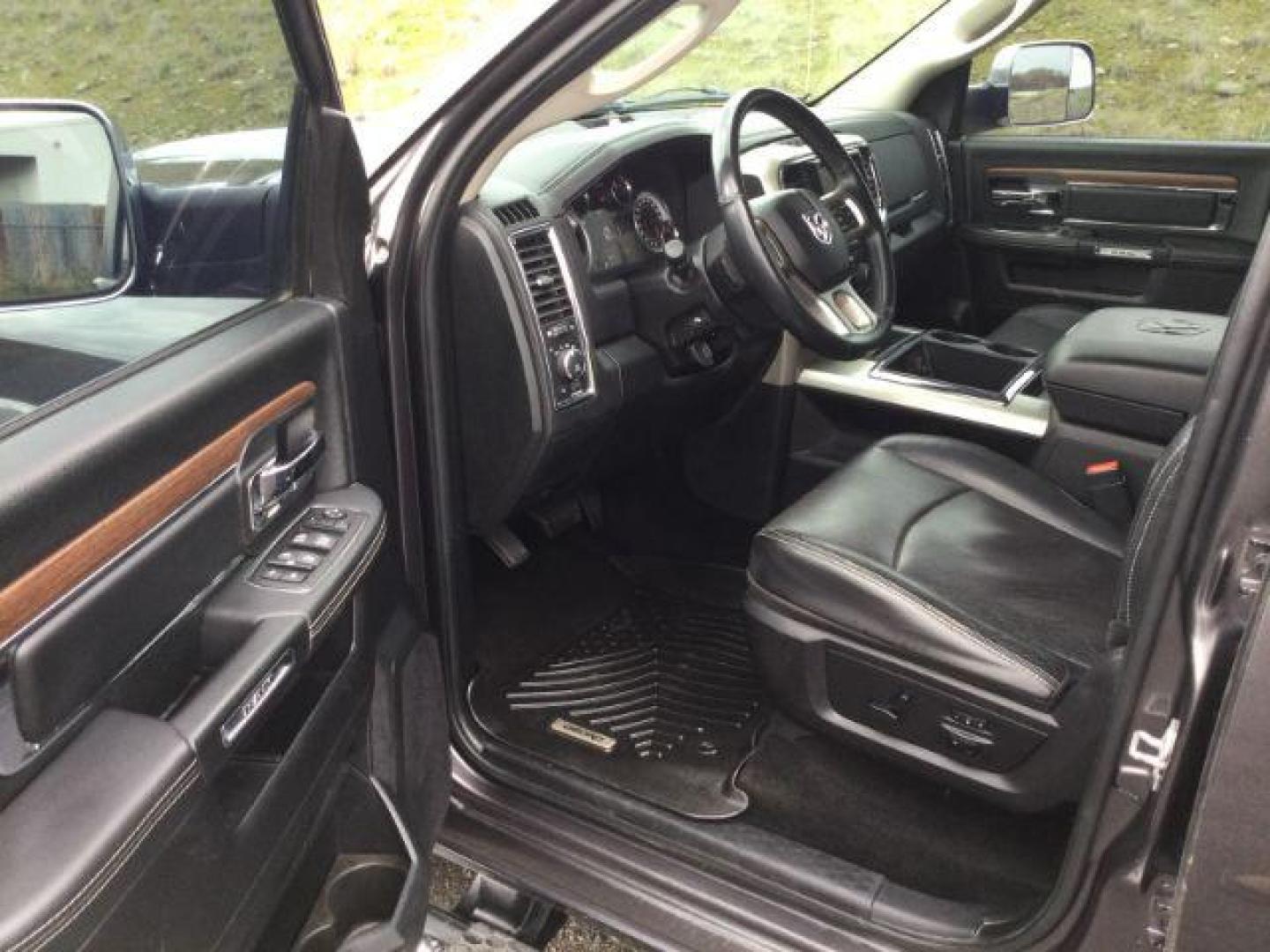 2015 Granite Crystal Metallic Clearcoat /Black Ram 1500 Laramie Crew Cab 4WD (1C6RR7VM0FS) with an EcoDiesel 3L V-6 diesel direct injection engine, 8-Speed Automatic transmission, located at 1801 Main Street, Lewiston, 83501, (208) 743-9371, 46.417065, -117.004799 - Photo#3