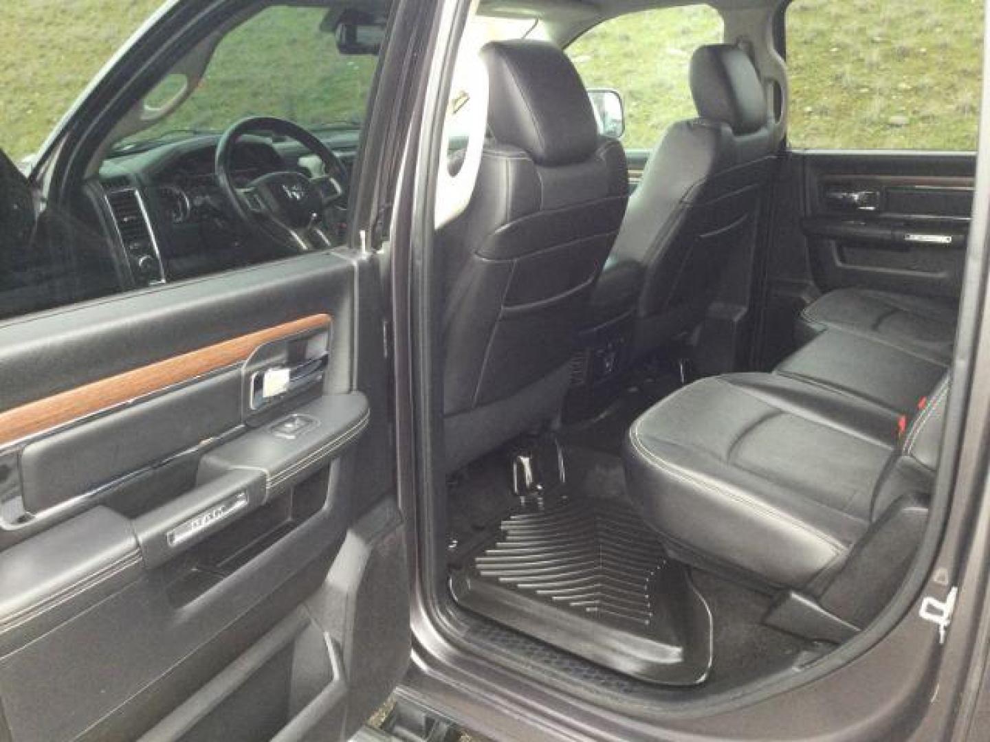 2015 Granite Crystal Metallic Clearcoat /Black Ram 1500 Laramie Crew Cab 4WD (1C6RR7VM0FS) with an EcoDiesel 3L V-6 diesel direct injection engine, 8-Speed Automatic transmission, located at 1801 Main Street, Lewiston, 83501, (208) 743-9371, 46.417065, -117.004799 - Photo#5