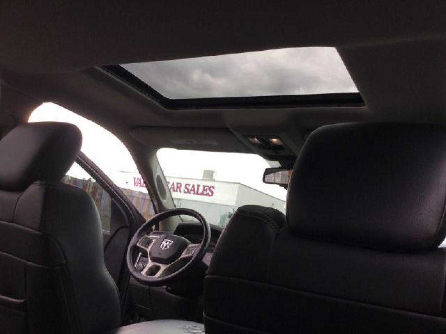 2015 Granite Crystal Metallic Clearcoat /Black Ram 1500 Laramie Crew Cab 4WD (1C6RR7VM0FS) with an EcoDiesel 3L V-6 diesel direct injection engine, 8-Speed Automatic transmission, located at 1801 Main Street, Lewiston, 83501, (208) 743-9371, 46.417065, -117.004799 - Photo#17