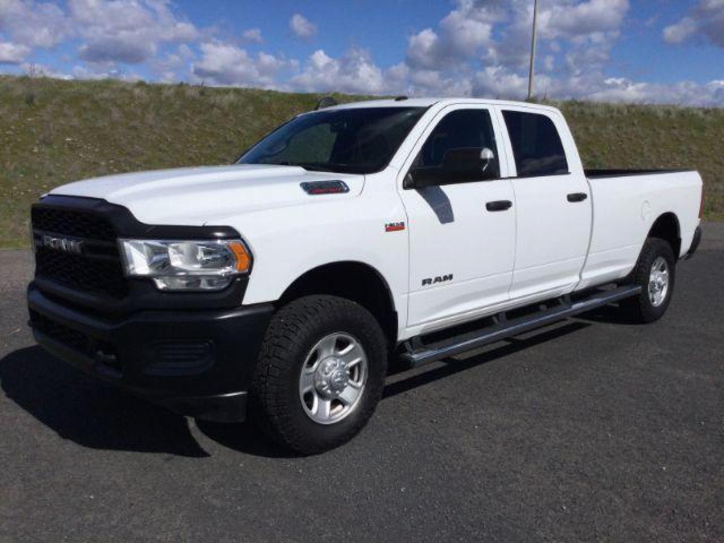 2021 Bright White Clearcoat /Diesel Gray/Black Ram 3500 Tradesman Crew Cab 4x4 8' Box (3C63R3GJ6MG) with an HEMI 6.4L V-8 VVT variable valve control engine, 6-Speed Automatic transmission, located at 1801 Main Street, Lewiston, 83501, (208) 743-9371, 46.417065, -117.004799 - Photo#0