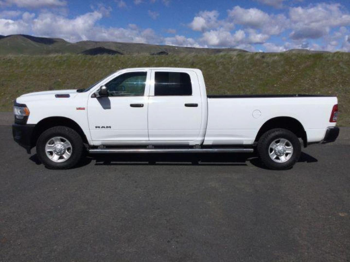 2021 Bright White Clearcoat /Diesel Gray/Black Ram 3500 Tradesman Crew Cab 4x4 8' Box (3C63R3GJ6MG) with an HEMI 6.4L V-8 VVT variable valve control engine, 6-Speed Automatic transmission, located at 1801 Main Street, Lewiston, 83501, (208) 743-9371, 46.417065, -117.004799 - Photo#1