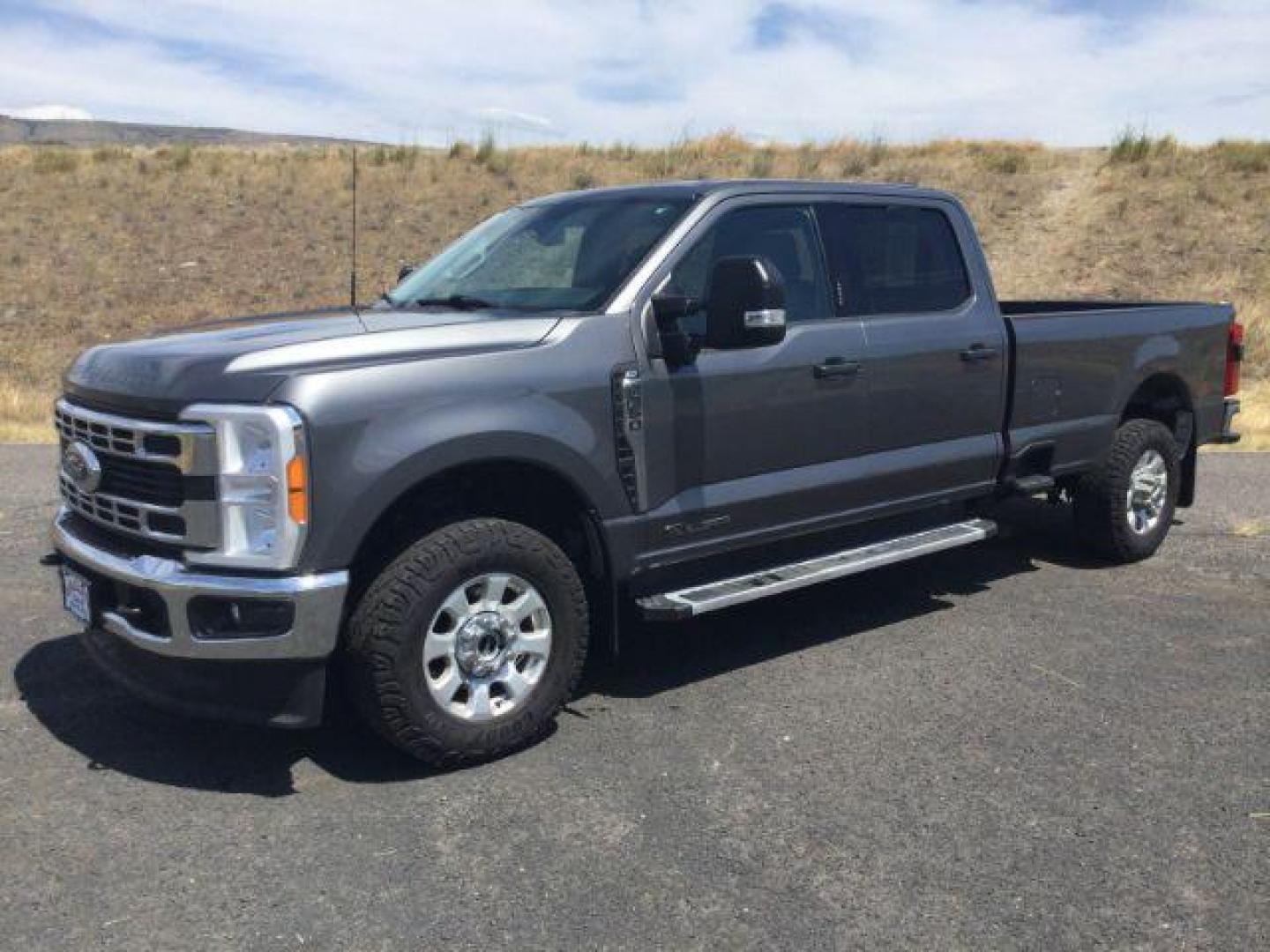 2023 Carbonized Gray Metallic /Medium Dark Slate Ford F-350 XLT (1FT8W3BT4PE) with an Powerstroke 6.7L V-8 diesel direct injection engine, 10 speed automatic transmission, located at 1801 Main Street, Lewiston, 83501, (208) 743-9371, 46.417065, -117.004799 - Photo#0