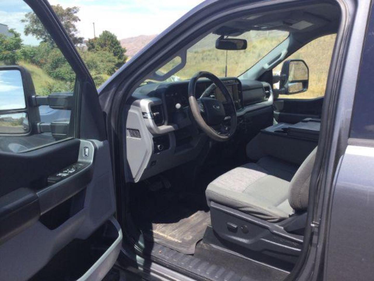 2023 Carbonized Gray Metallic /Medium Dark Slate Ford F-350 XLT (1FT8W3BT4PE) with an Powerstroke 6.7L V-8 diesel direct injection engine, 10 speed automatic transmission, located at 1801 Main Street, Lewiston, 83501, (208) 743-9371, 46.417065, -117.004799 - Photo#3