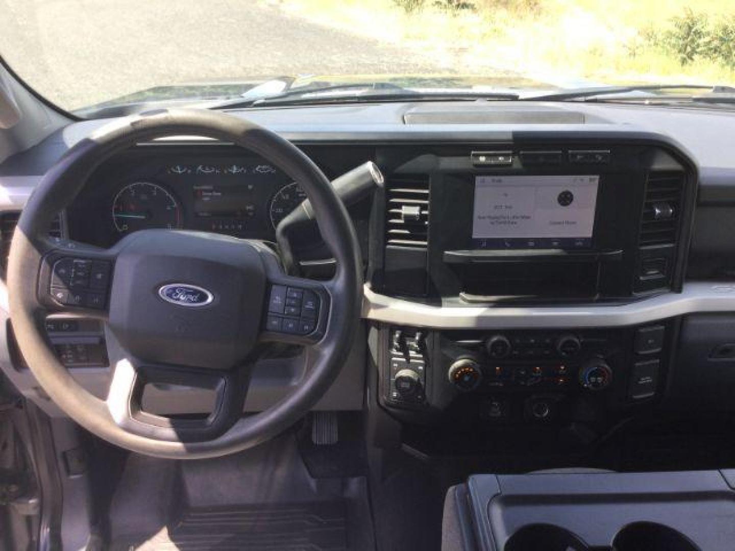 2023 Carbonized Gray Metallic /Medium Dark Slate Ford F-350 XLT (1FT8W3BT4PE) with an Powerstroke 6.7L V-8 diesel direct injection engine, 10 speed automatic transmission, located at 1801 Main Street, Lewiston, 83501, (208) 743-9371, 46.417065, -117.004799 - Photo#4