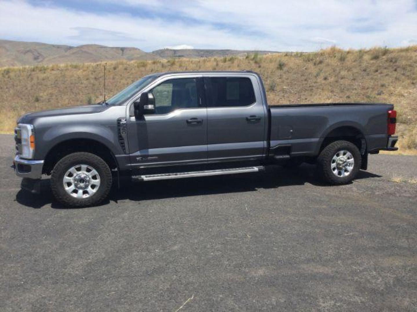 2023 Carbonized Gray Metallic /Medium Dark Slate Ford F-350 XLT (1FT8W3BT4PE) with an Powerstroke 6.7L V-8 diesel direct injection engine, 10 speed automatic transmission, located at 1801 Main Street, Lewiston, 83501, (208) 743-9371, 46.417065, -117.004799 - Photo#6