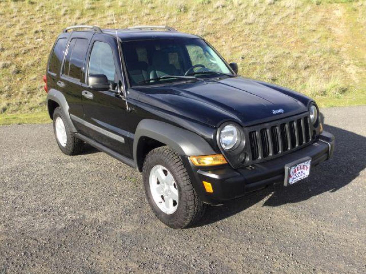 2006 Black Clearcoat /Medium Slate Gray Jeep Liberty Sport (1J4GL48K06W) with an Power Tech 3.7L V-6 regular unleaded engine, automatic transmission, located at 1801 Main Street, Lewiston, 83501, (208) 743-9371, 46.417065, -117.004799 - Photo#0