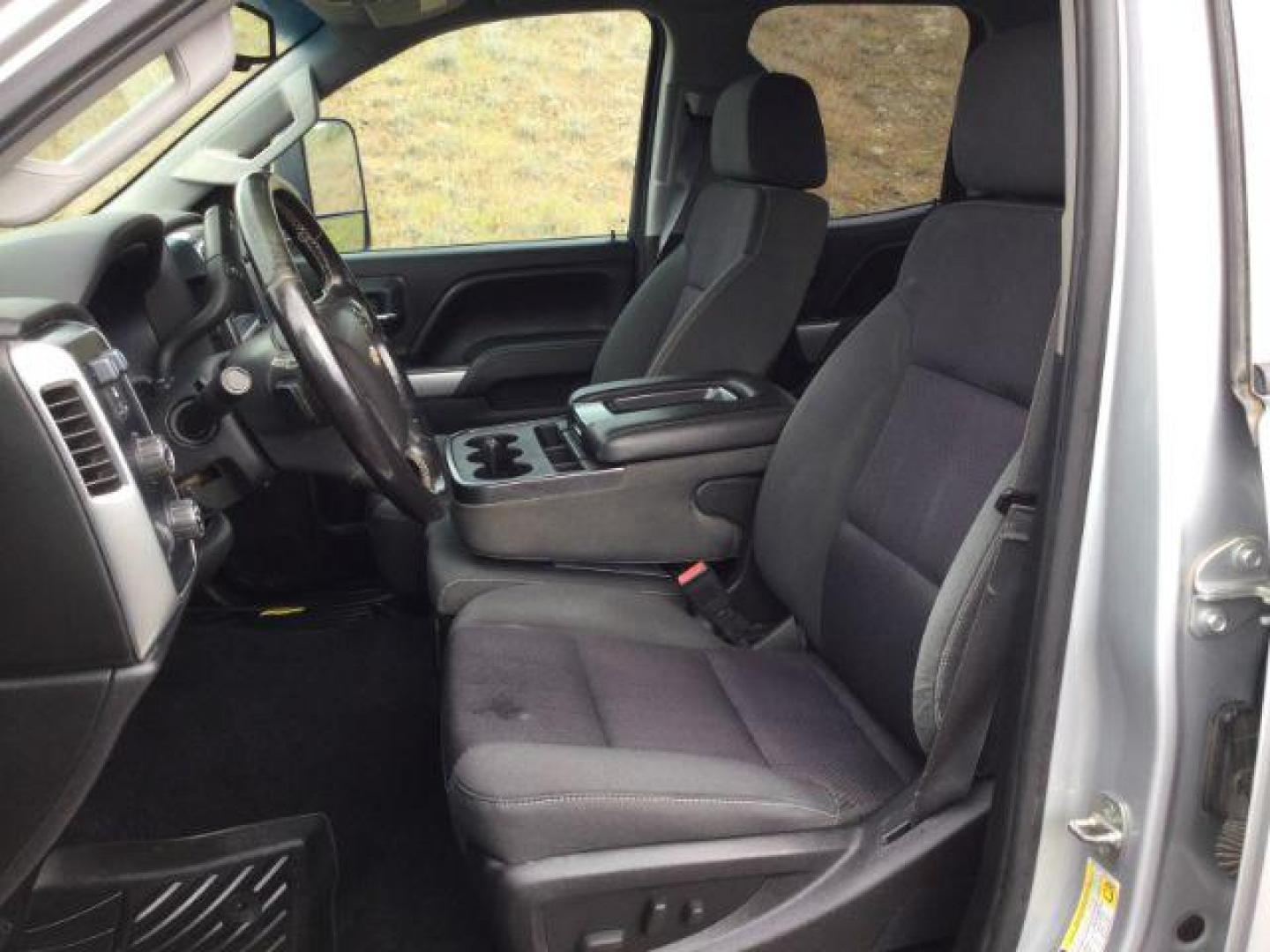 2015 Silver Ice Metallic /Dark Ash/Jet Black Chevrolet Silverado 2500HD LT (1GC2KVEG3FZ) with an Vortec 6L V-8 variable valve control engine, Auto, 6-Spd HD Overdrive transmission, located at 1801 Main Street, Lewiston, 83501, (208) 743-9371, 46.417065, -117.004799 - Photo#4