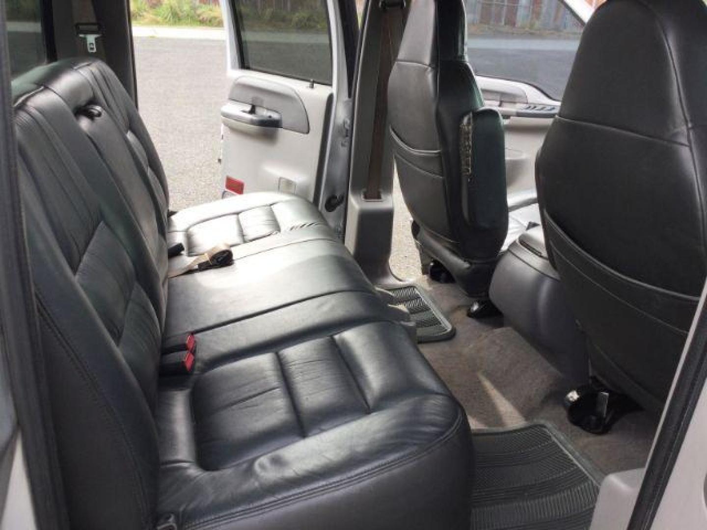 2001 Silver Clearcoat Metallic /Black Leather Ford F-250 XLT Crew Cab Long Bed 4WD (1FTNW21F11E) with an Powerstroke 7.3L V-8 diesel direct injection engine, 4 speed automatic transmission, located at 1801 Main Street, Lewiston, 83501, (208) 743-9371, 46.417065, -117.004799 - Photo#14