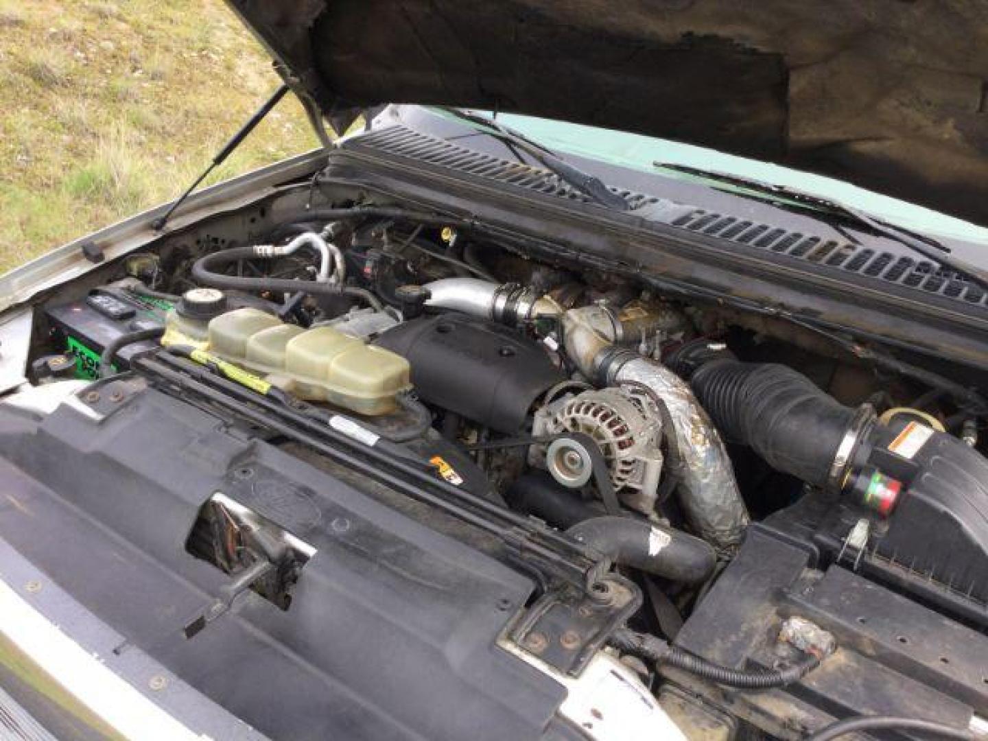 2001 Silver Clearcoat Metallic /Black Leather Ford F-250 XLT Crew Cab Long Bed 4WD (1FTNW21F11E) with an Powerstroke 7.3L V-8 diesel direct injection engine, 4 speed automatic transmission, located at 1801 Main Street, Lewiston, 83501, (208) 743-9371, 46.417065, -117.004799 - Photo#20